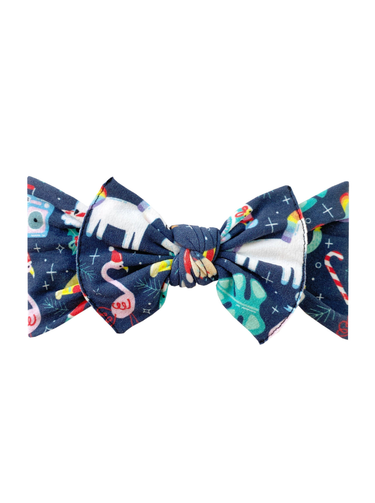 Colorful bowtie with fun patterns, including unicorns, flamingos, and candy canes on a dark blue background.
