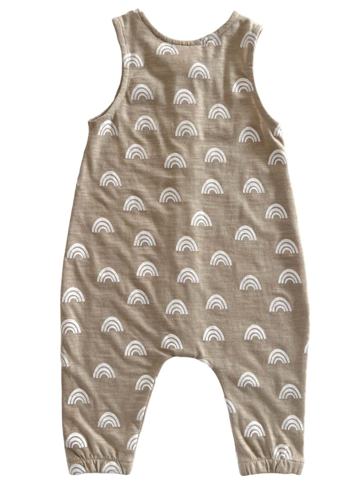 Tan baby jumpsuit with white rainbow patterns, featuring leg openings and sleeveless design. Ideal for casual wear.
