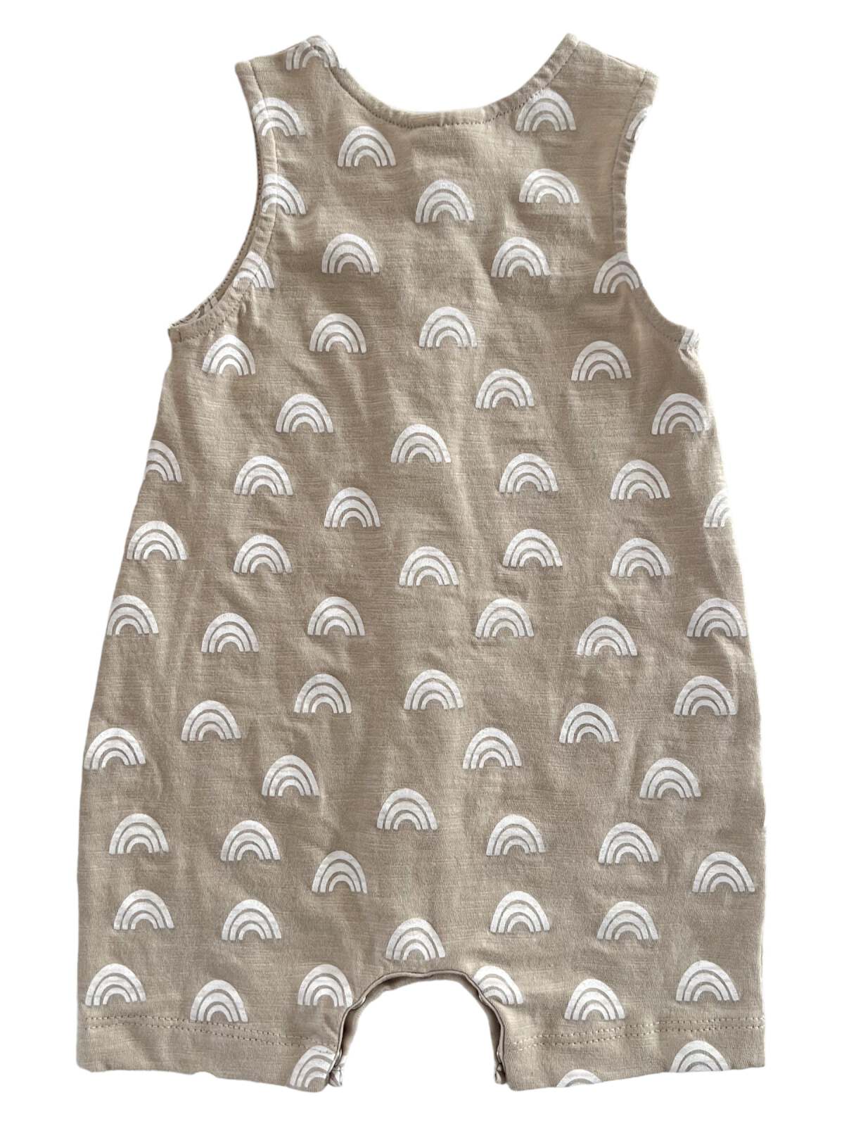 Tan toddler romper with white rainbow patterns on the back. Suitable for warm weather.