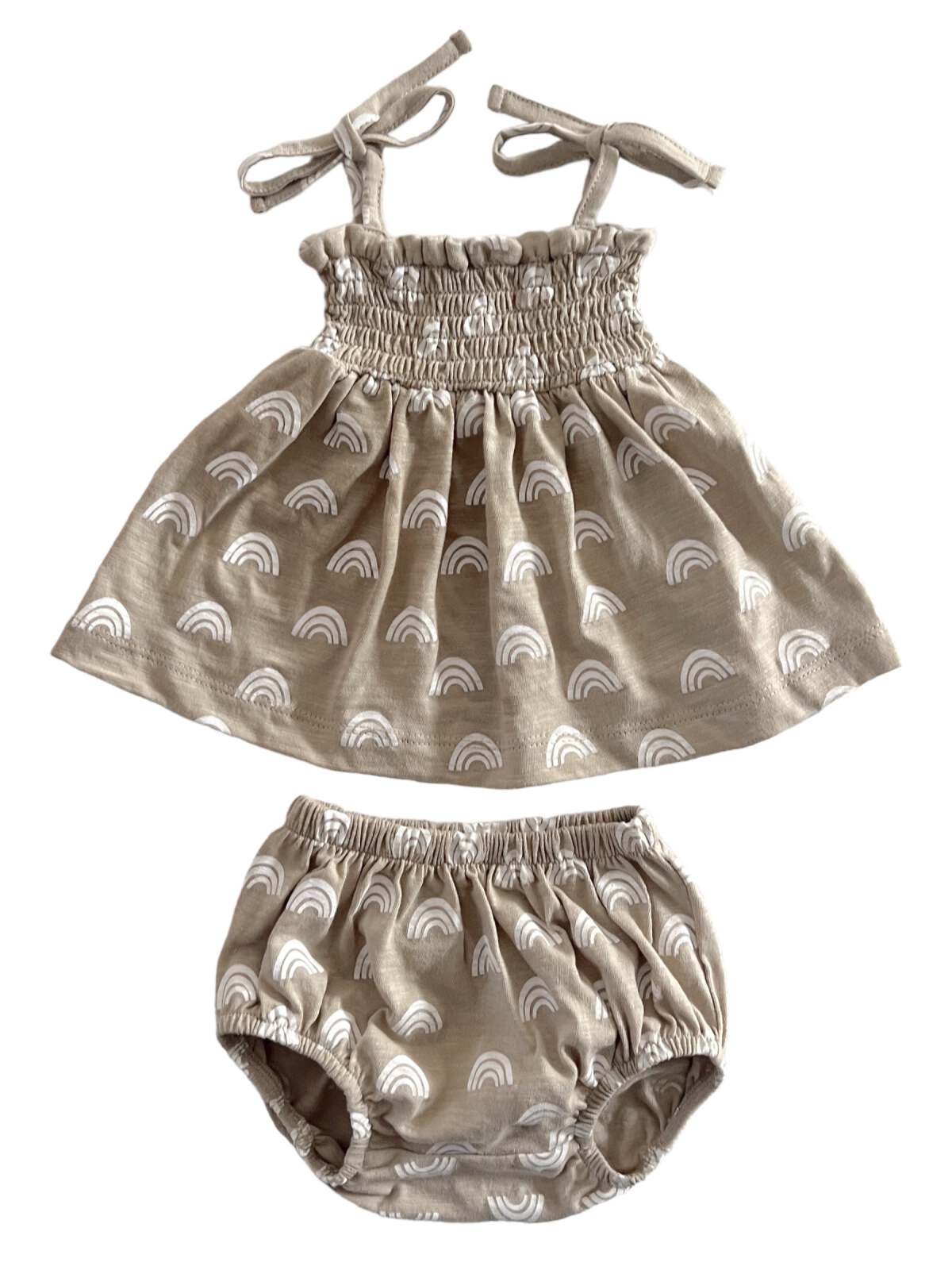 Beige girls' outfit with rainbow print, including a sleeveless top and matching bloomers.
