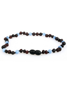 Colorful beaded necklace featuring red, blue, and black beads on a white background.