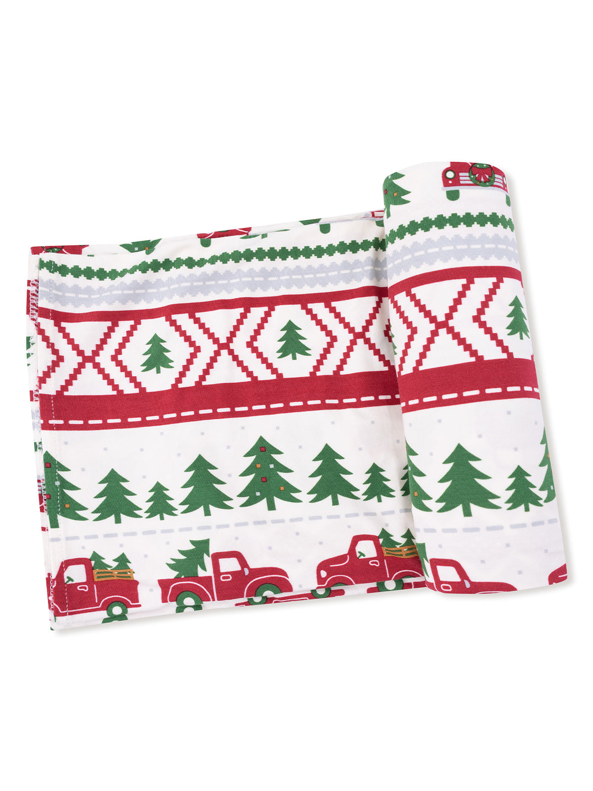 Holiday-themed fabric featuring red trucks and Christmas trees on a white background.