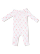 White infant onesie with pink bow print and ruffled neckline, designed for comfort and style.