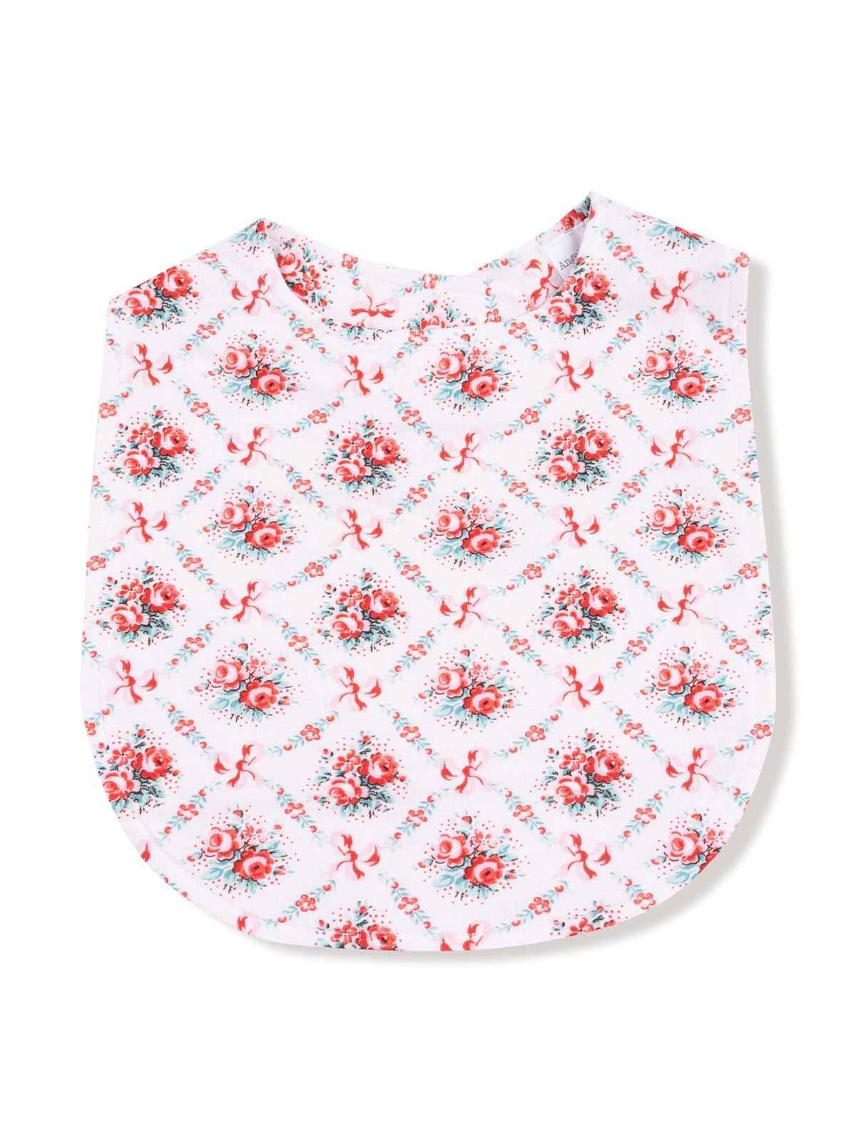 Floral-patterned fabric with red roses and ribbons on a white background, shaped like a top or bib.