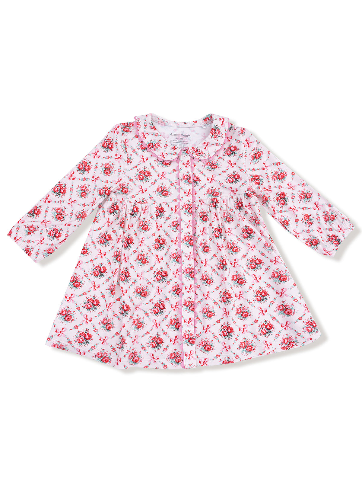 White dress with red floral pattern and bows, featuring long sleeves and a collar, suitable for young children.