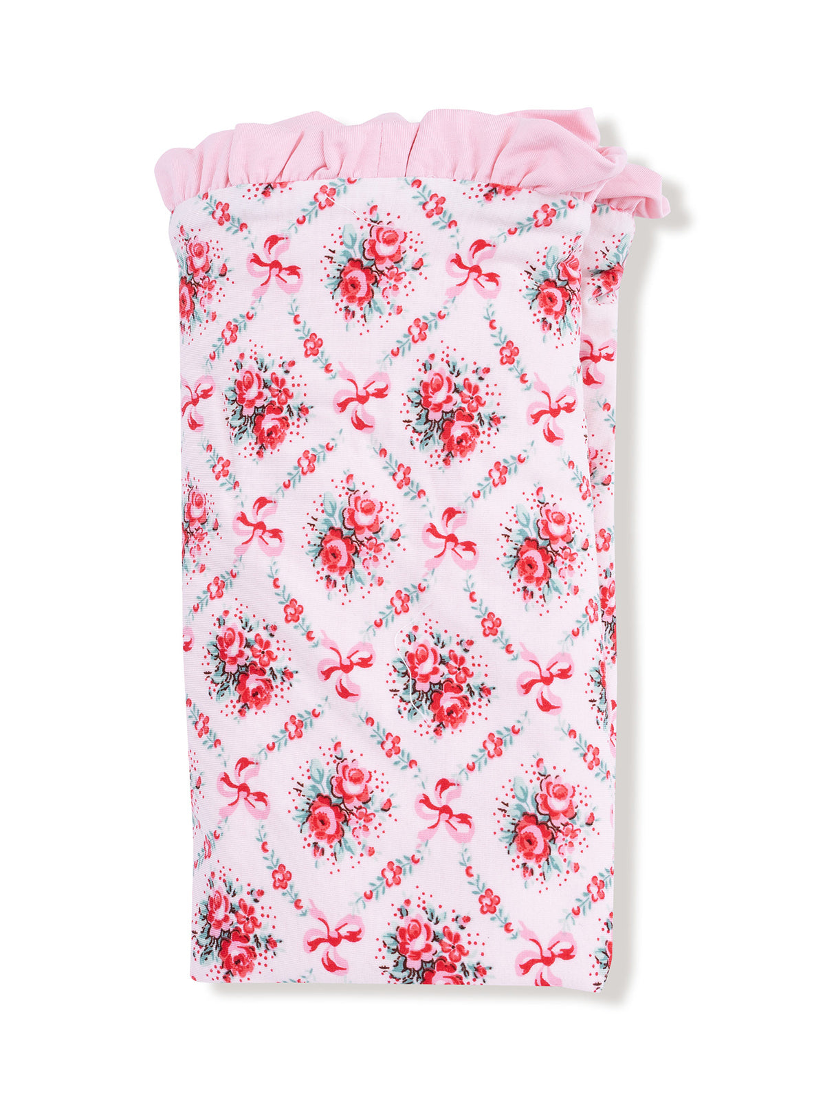 Floral-patterned fabric in pink with rose designs and bows, featuring a ruffled edge at the top.