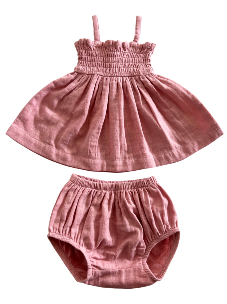Pink toddler dress with matching bloomers, featuring spaghetti straps and a flared skirt.