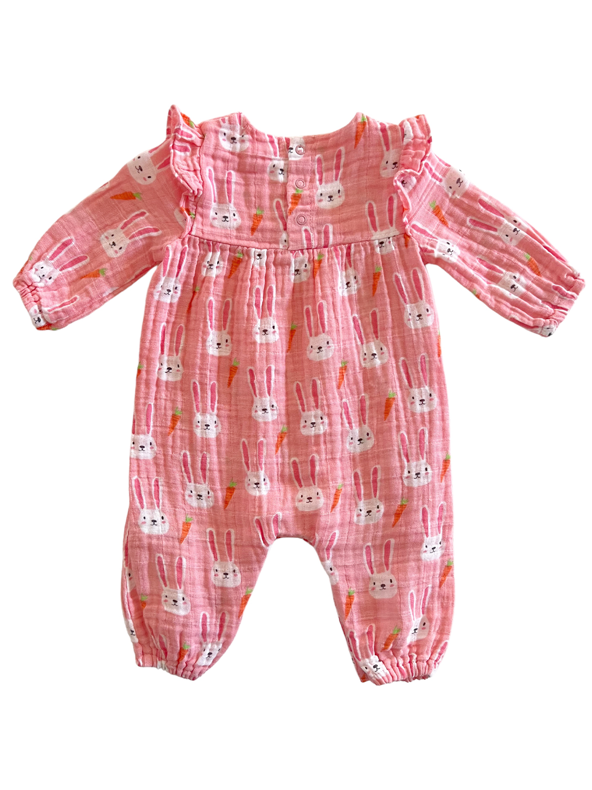Pink baby romper with bunny and carrot prints and ruffle detailing on the shoulders. Suitable for young children.