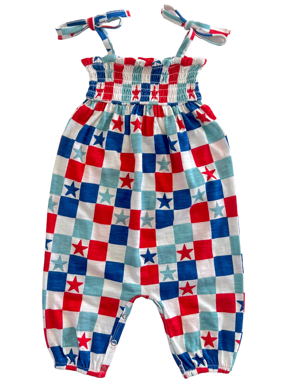 Children's romper with red, white, and blue checkered pattern and star designs, featuring tie straps and snap closure.