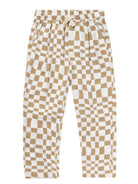 Beige and white checkered pants with an elastic waistband and drawstring. Suitable for casual wear.