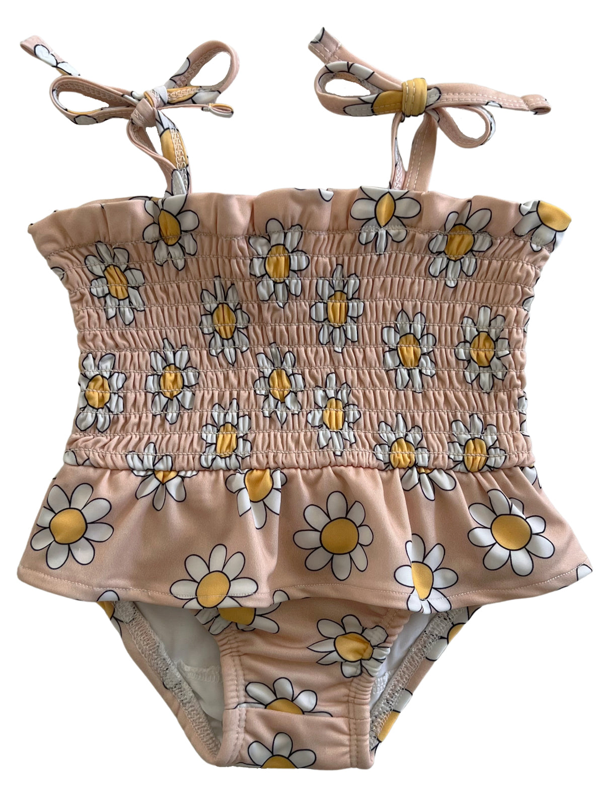 Girls' daisy-patterned swimsuit in light pink, featuring smocked bodice and shoulder ties.