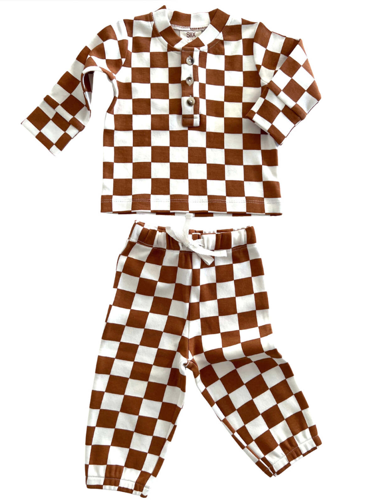 Brown and white checkered toddler pajama set featuring a long-sleeve top and matching pants.