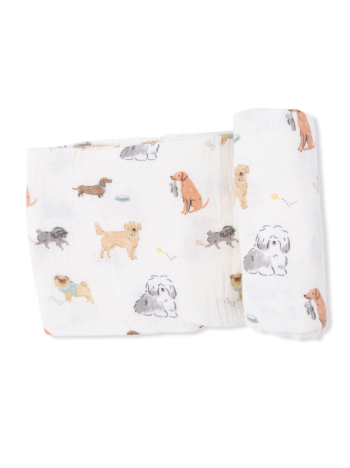 A soft blanket featuring playful dog illustrations on a white background.