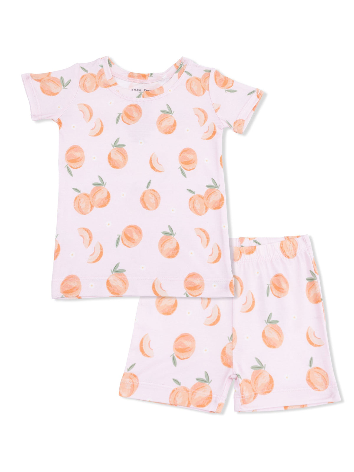 Children's two-piece pajama set featuring a light pink fabric with peach and flower patterns.