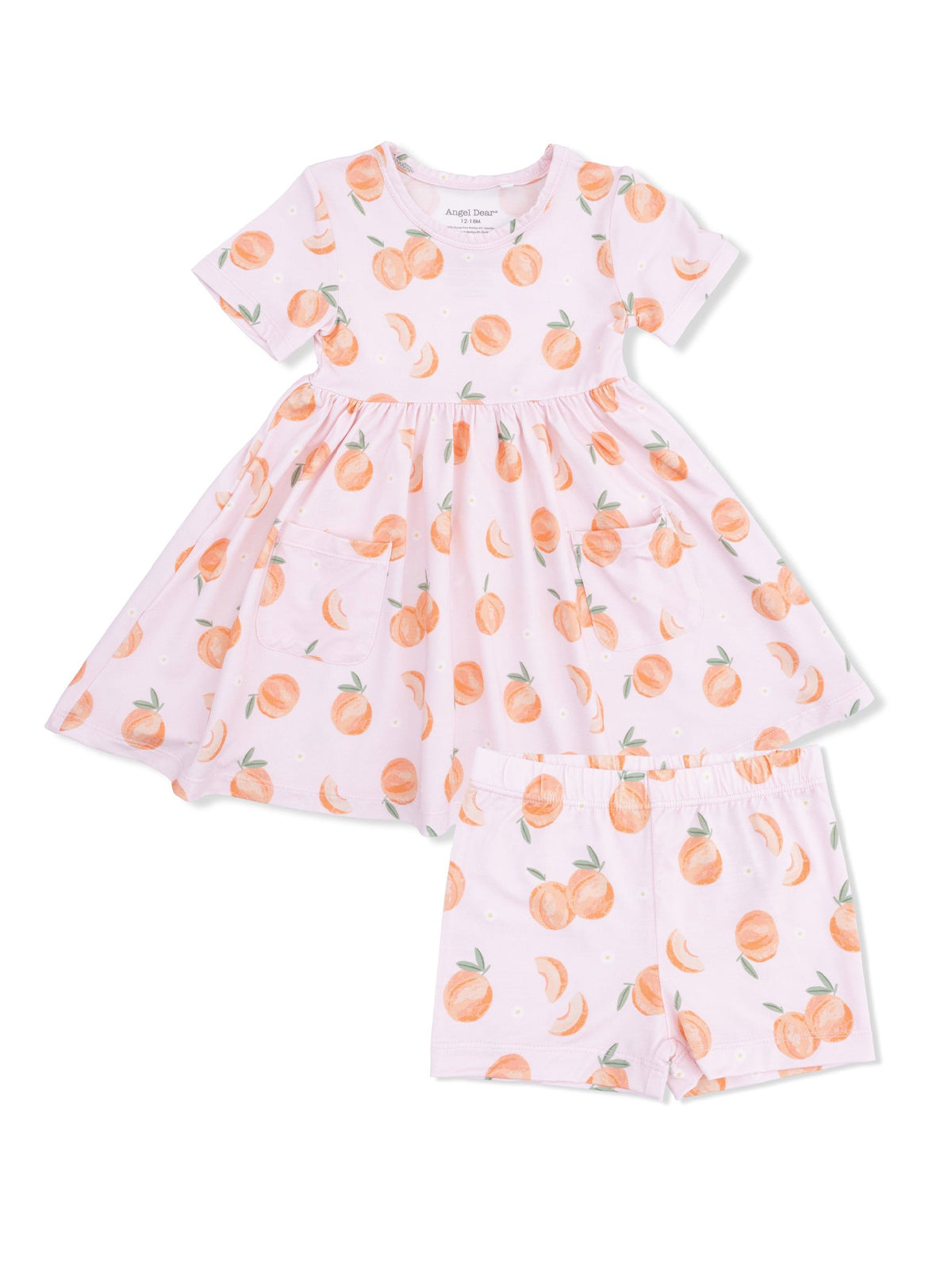 Pink dress with peach print and matching shorts, featuring a flared skirt and slight puff sleeves.