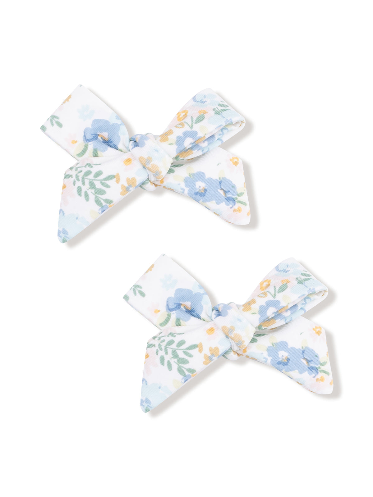 Two fabric hair bows with a floral pattern in blue, white, and yellow.