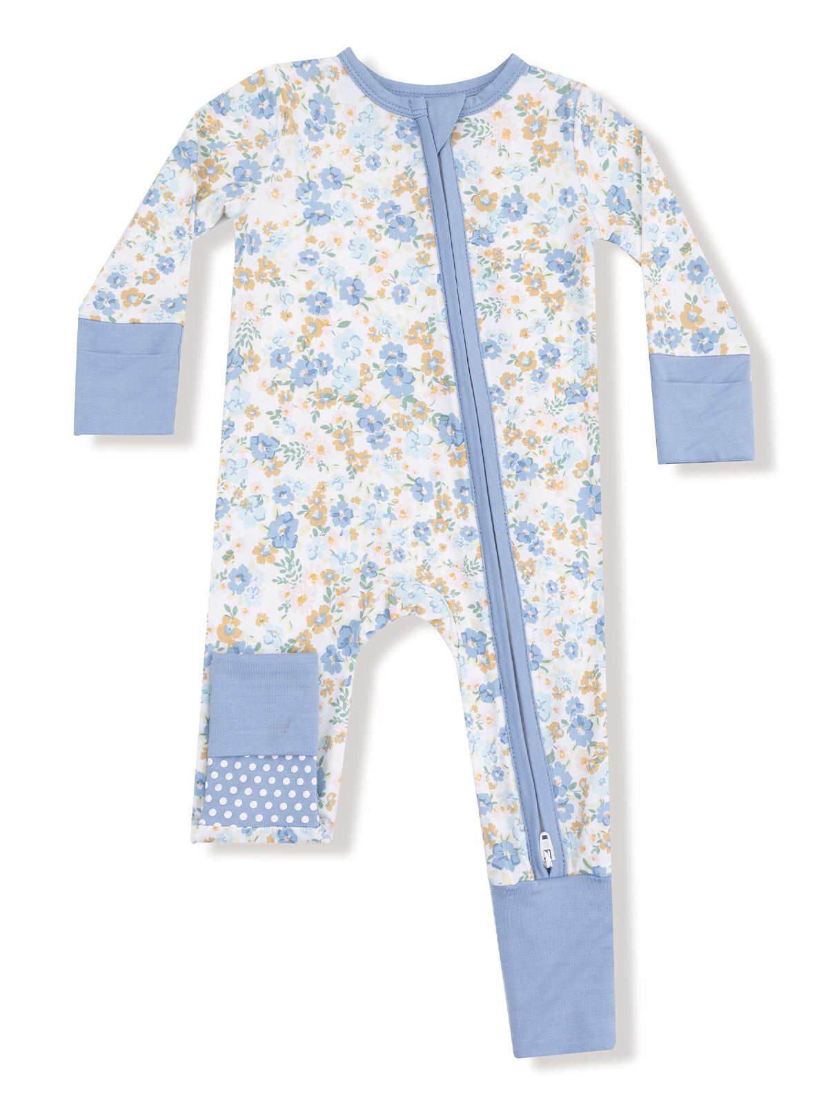 Floral-patterned baby onesie with long sleeves and a front zipper, featuring blue accents and polka dot patches.
