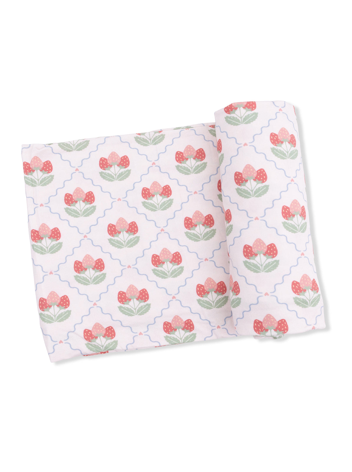 Floral fabric with pink strawberries and green leaves on a white background, rolled and flat.