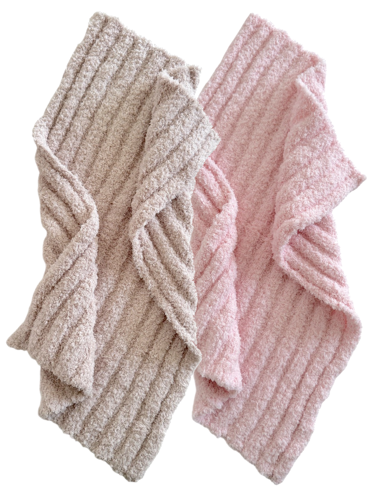 Two soft, textured towels, one in beige and the other in light pink, displayed together.