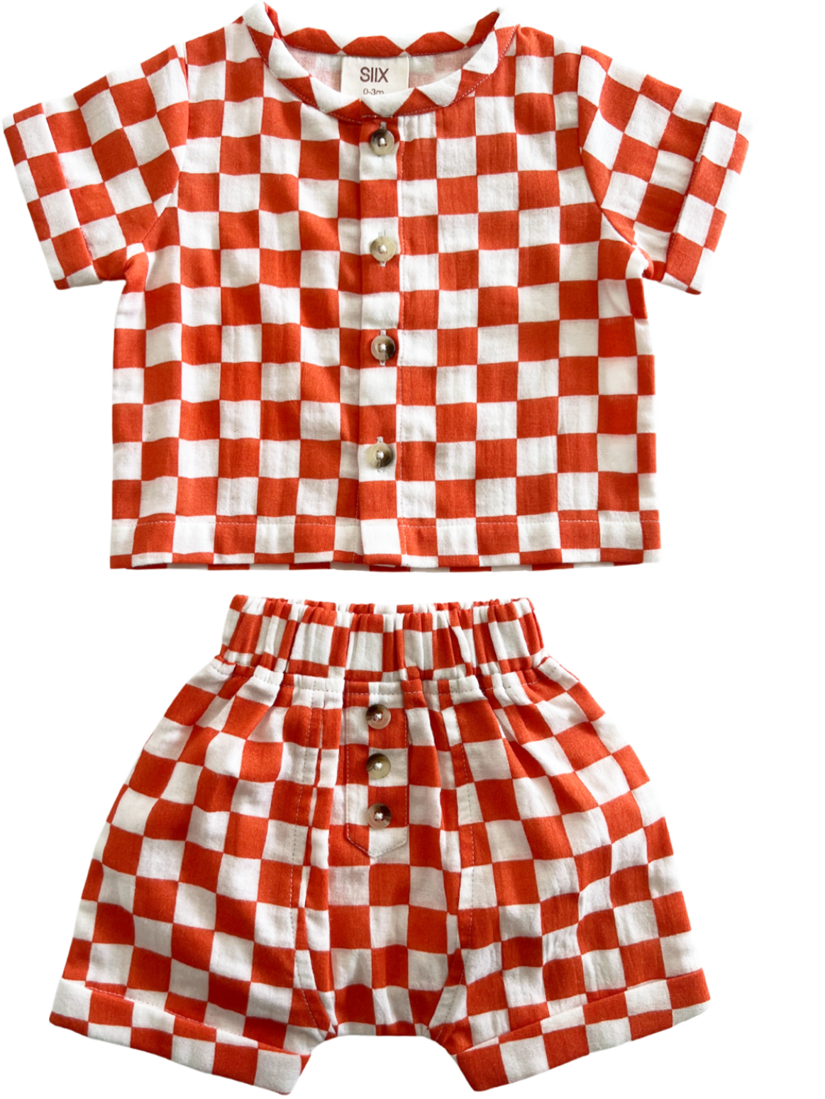 Red and white checkered toddler outfit with a short-sleeve shirt and matching shorts.