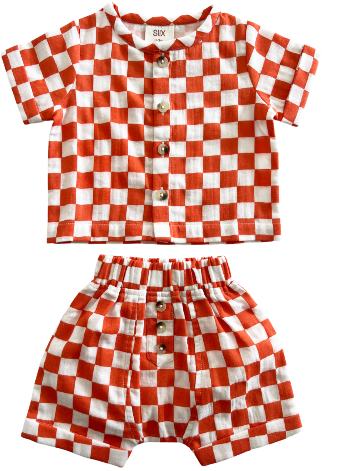 Red and white checkered toddler outfit with a short-sleeve shirt and matching shorts.