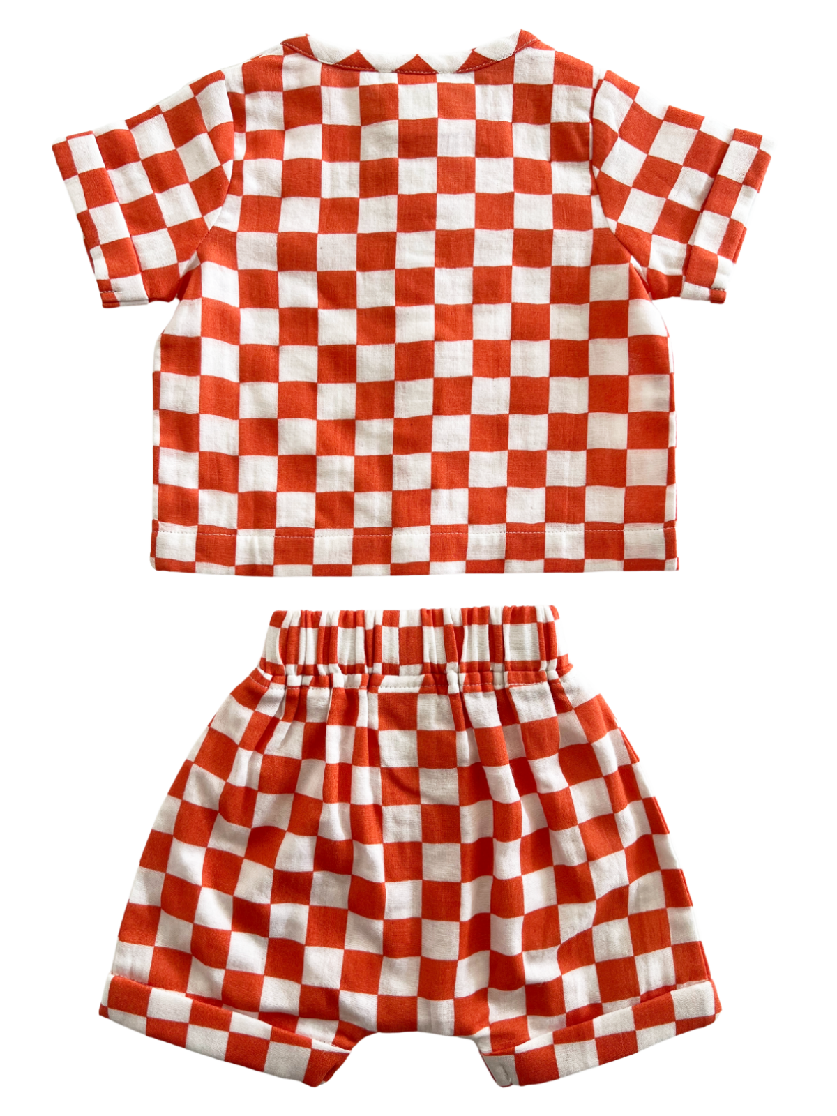 Child's outfit featuring red and white checkered patterned short-sleeve top and matching shorts, view from back.
