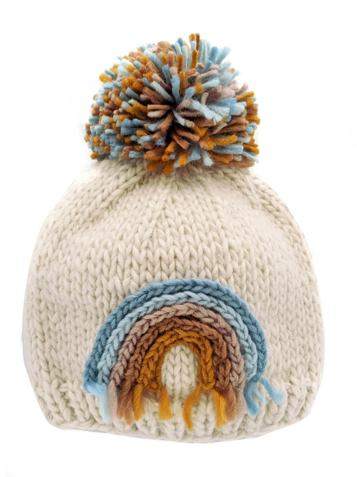Cream knit beanie with a colorful pom-pom and a rainbow design stitched on the front.