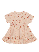 Peach short-sleeve dress with brown cherry prints and a ruffled hem, ideal for casual wear.