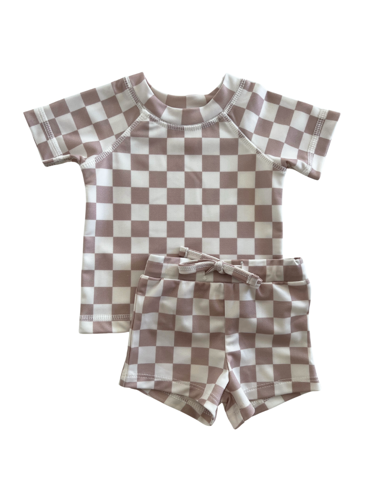 Kids' swim set featuring a short-sleeve top and matching shorts in a pink and white checkered pattern.