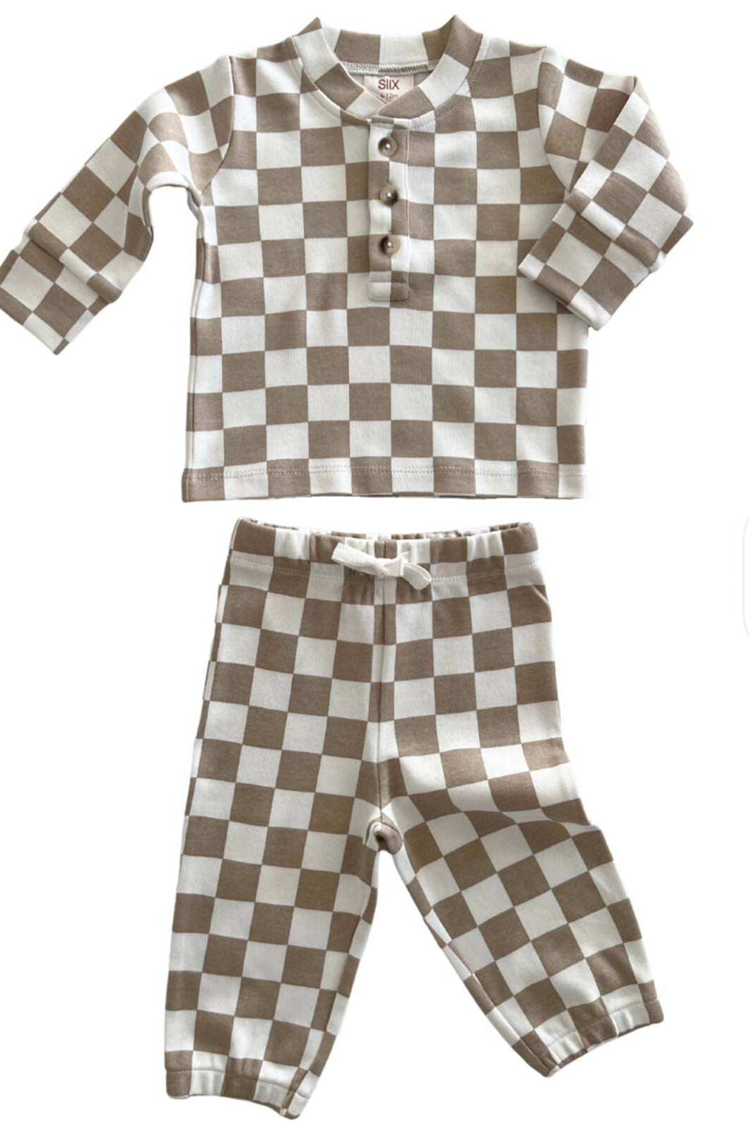 Brown and white checkered baby outfit with long-sleeve top and matching pants. Suitable for cozy wear.