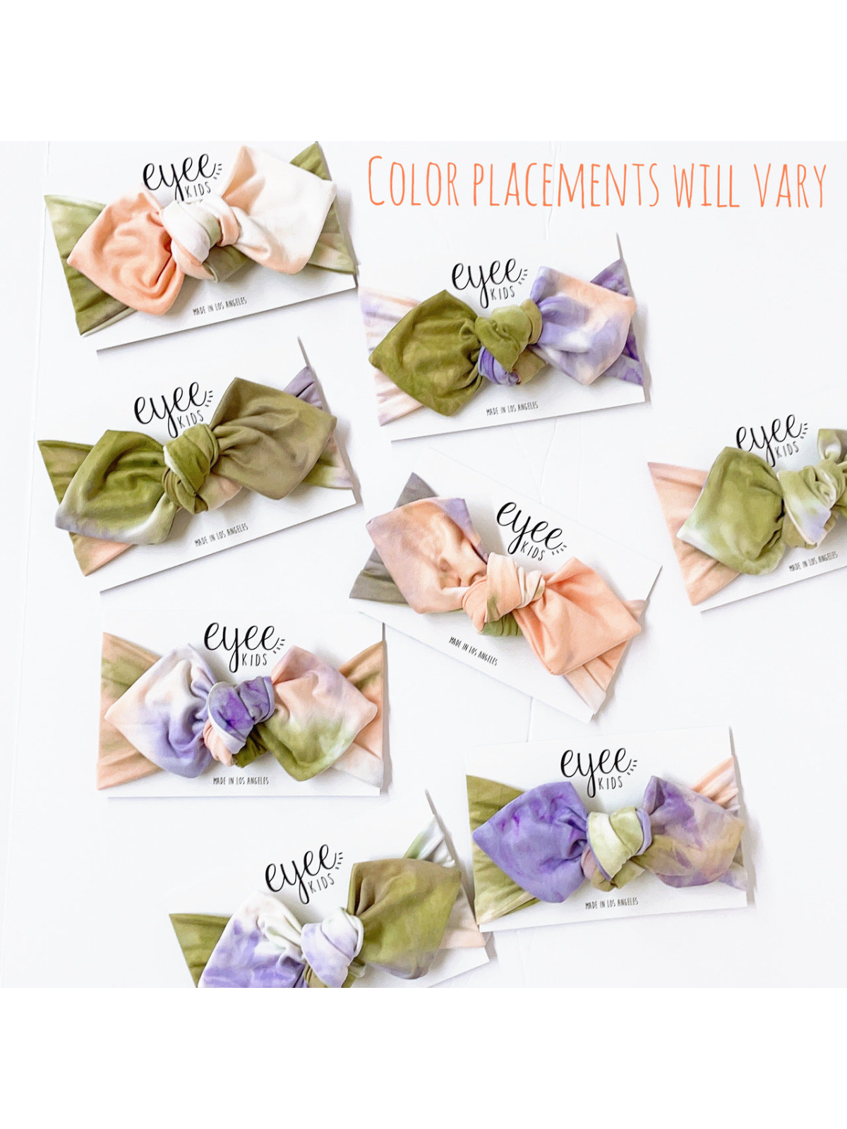 Colorful hair bows on display with varying placements; brand name "eyee kids" visible on packaging.