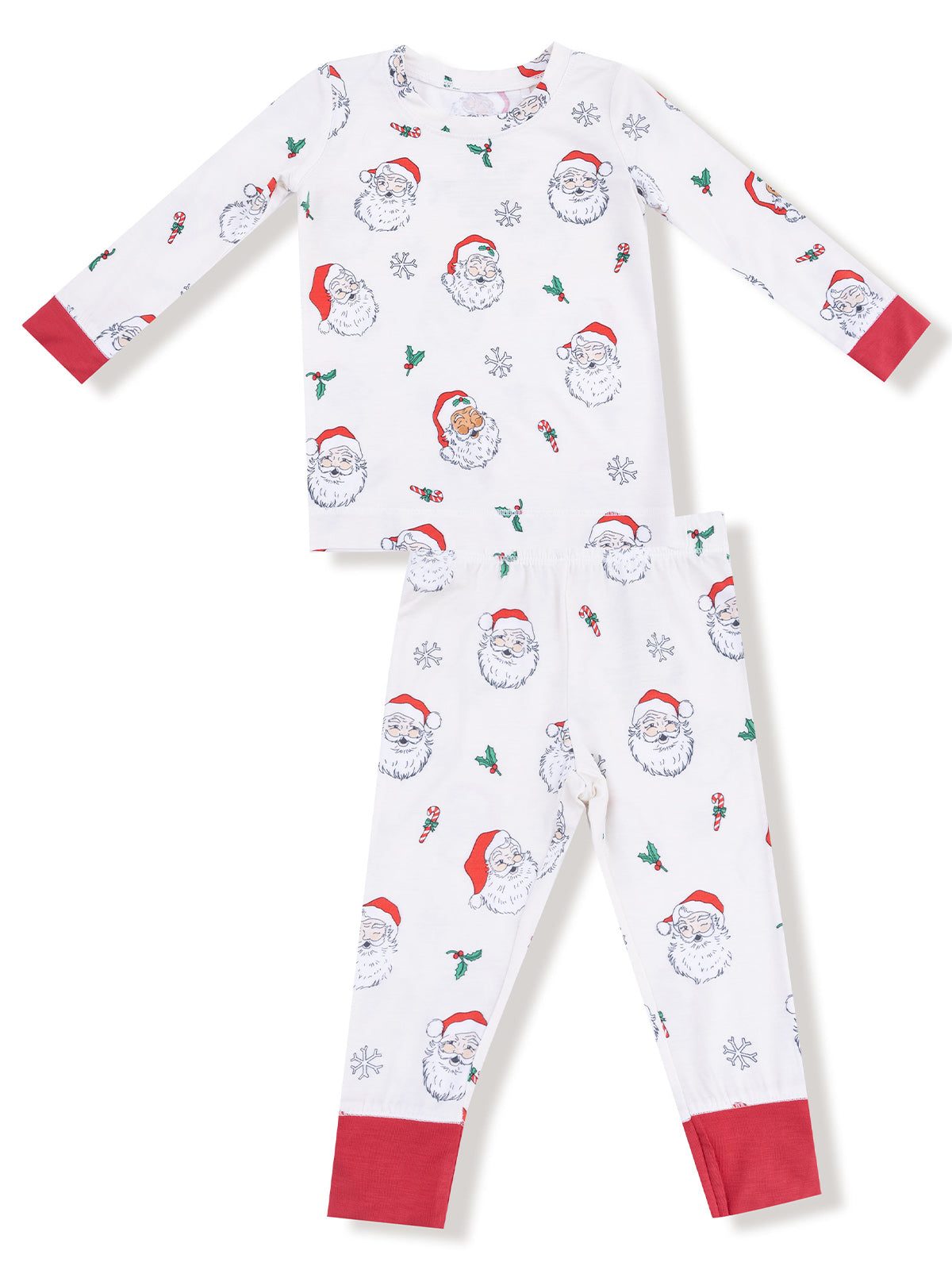 White holiday pajamas featuring Santa Claus, candy canes, and snowflakes, with red accents on sleeves and cuffs.