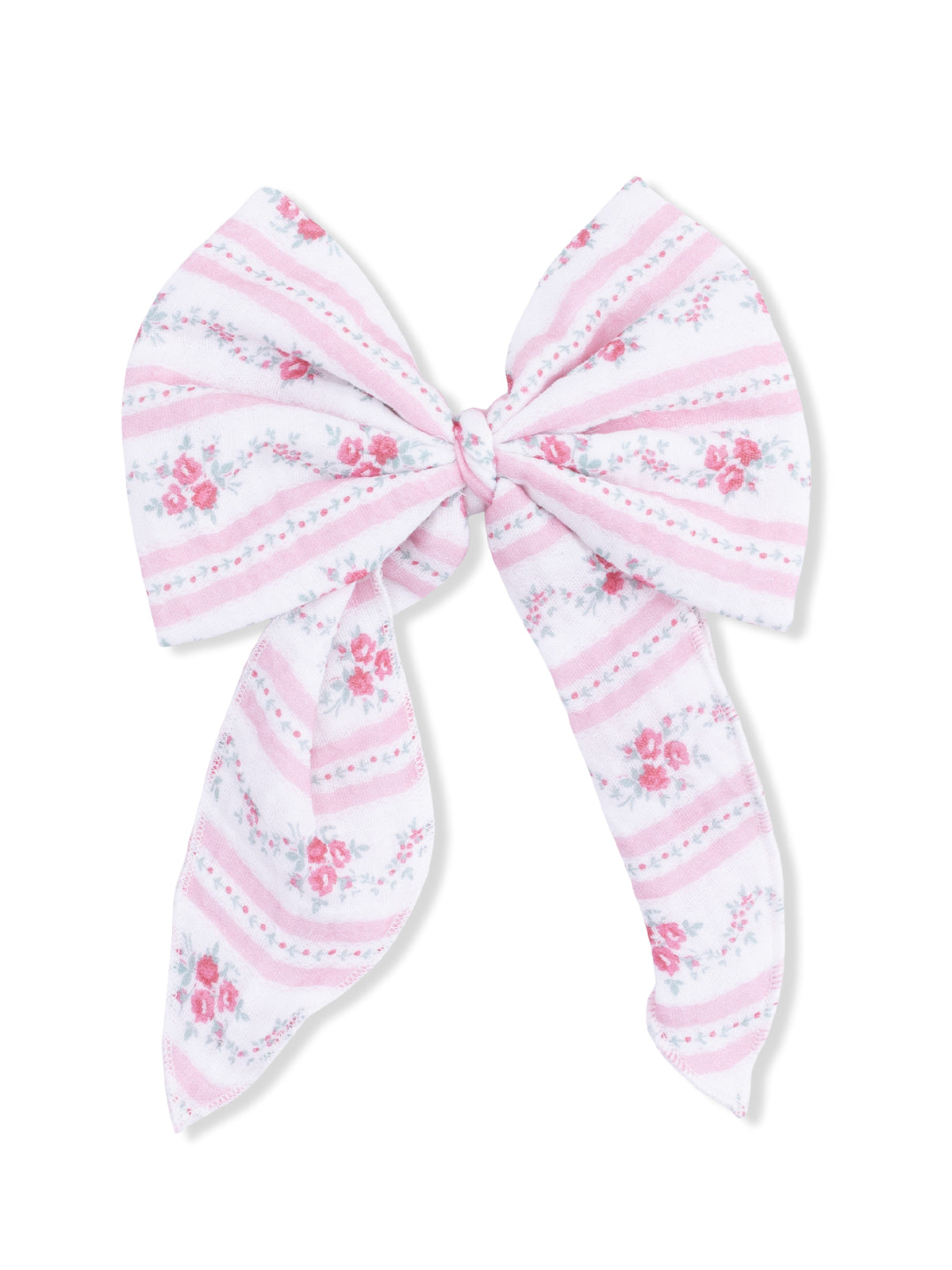 Pink floral-patterned hair bow with striped design and long tails. Perfect accessory for a sweet look.