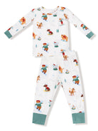 Children's pajama set featuring playful animal designs engaged in winter activities on a white background.