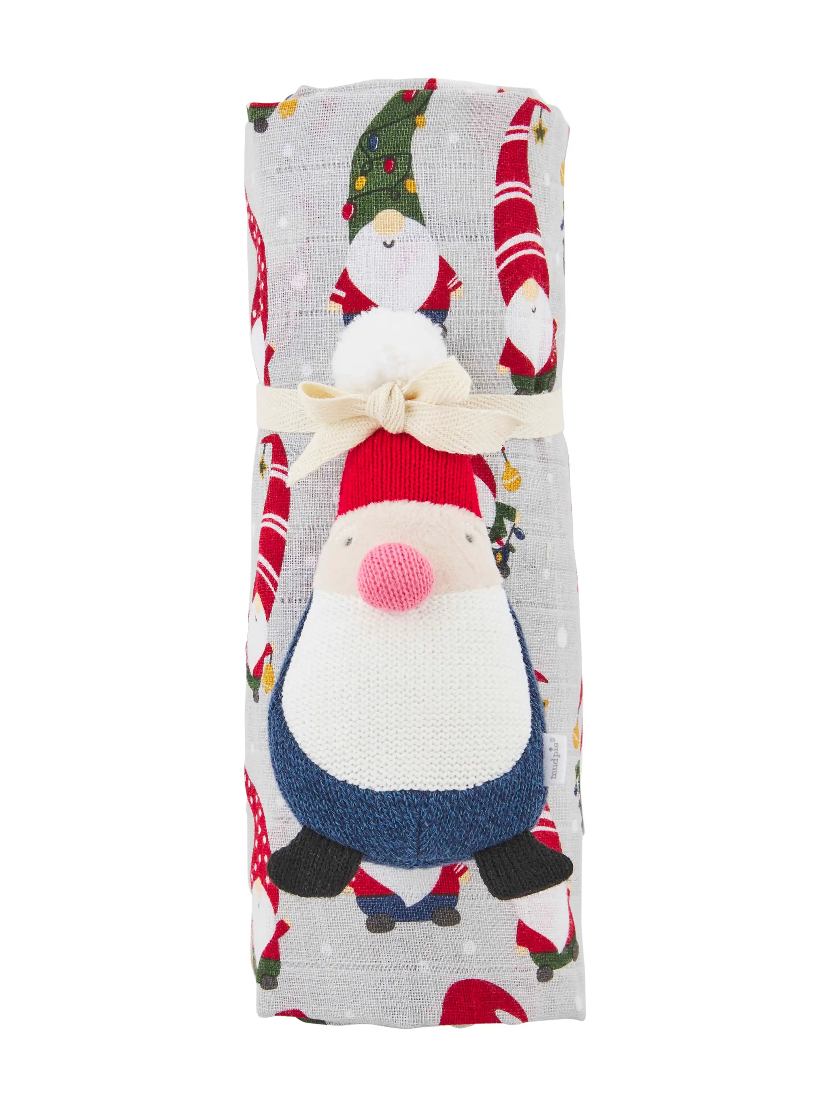 Gnome-themed decorative towel with a festive design and tied ribbon detail. Ideal for holiday decor.