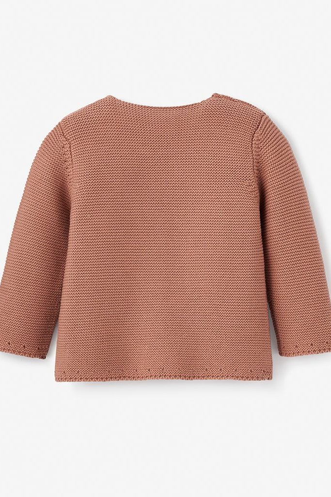 Back view of a textured, long-sleeve, rust-colored sweater on a white background.