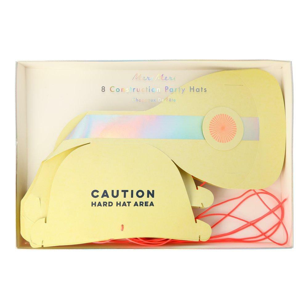 Box of eight yellow construction party hats with "Caution Hard Hat Area" printed on one hat.