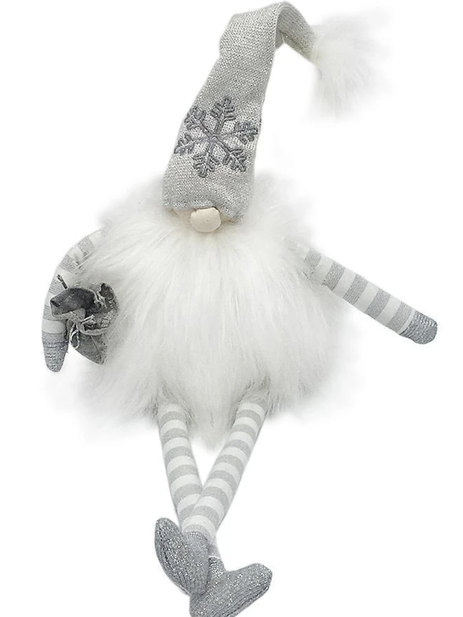 A whimsical white gnome with a silver hat, striped legs, and a fluffy body, holding a small gift.