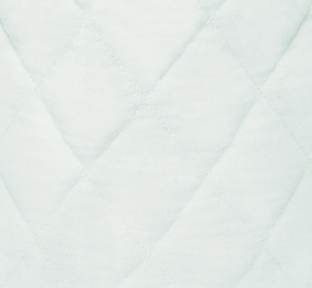 Light blue quilted fabric with a diamond pattern texture.