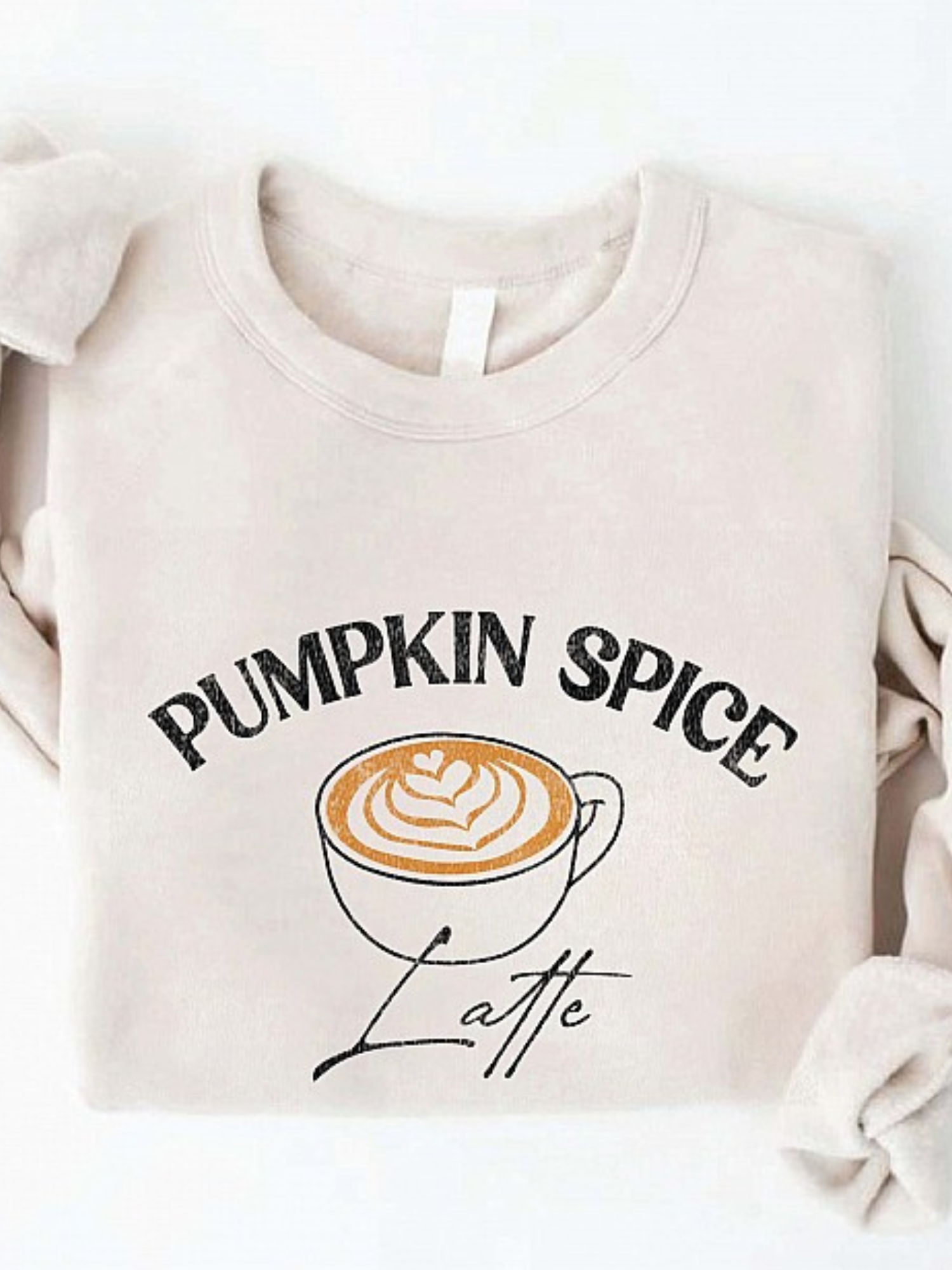 Pumpkin spice latte graphic on a cozy beige sweatshirt, stylish and perfect for fall fashion.