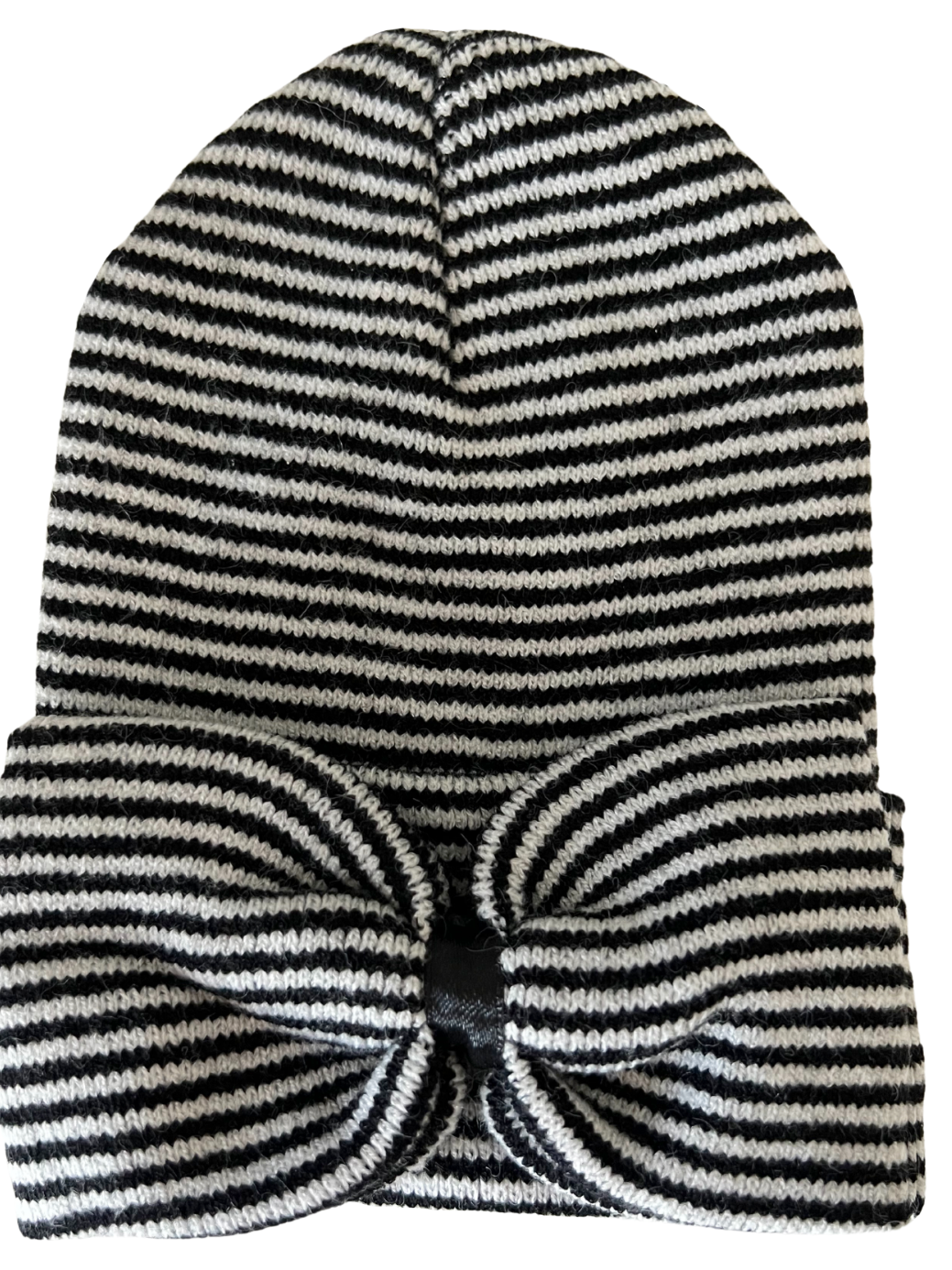 Striped black and white beanie hat with a large bow accent on the front.