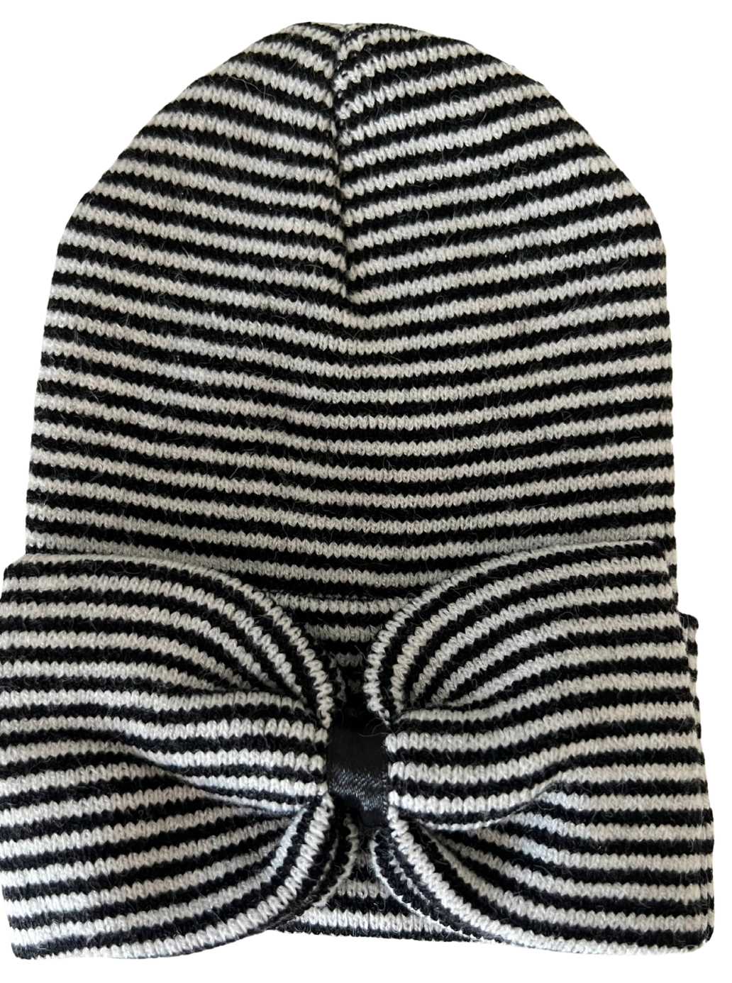 Striped black and white beanie hat with a large bow accent on the front.