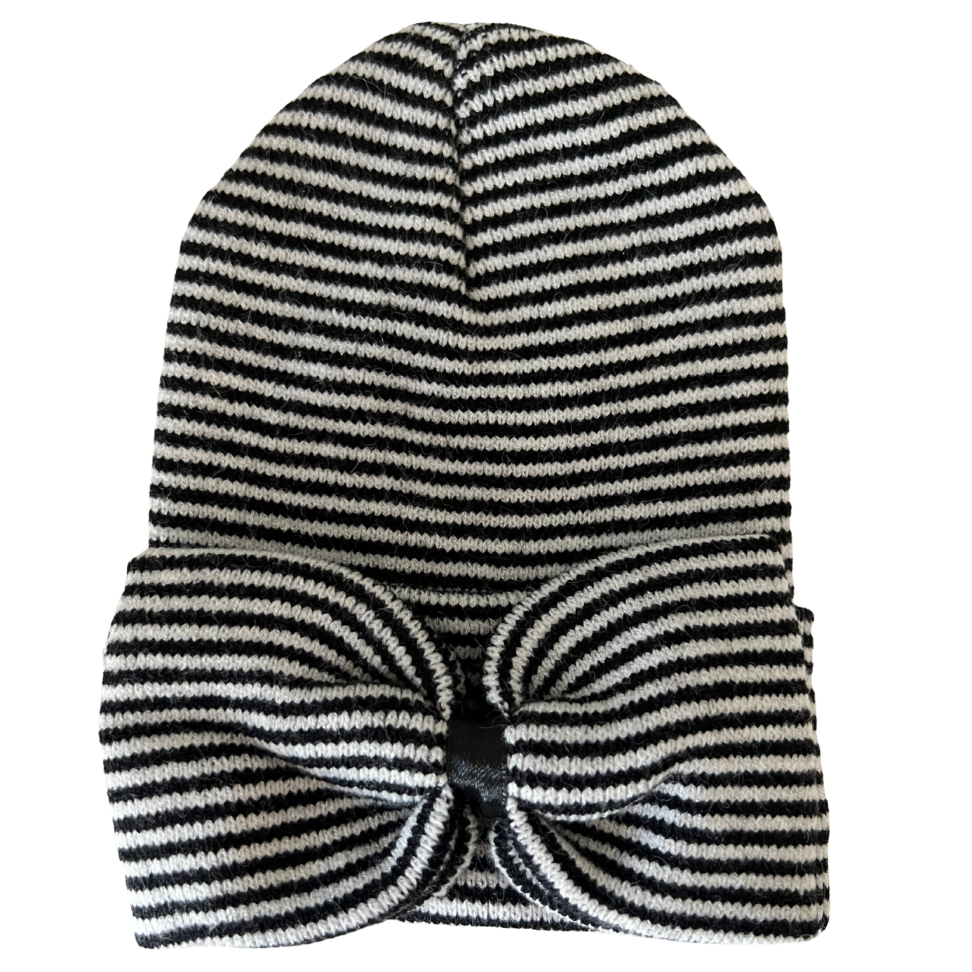Striped black and white beanie hat with a large bow accent on the front.