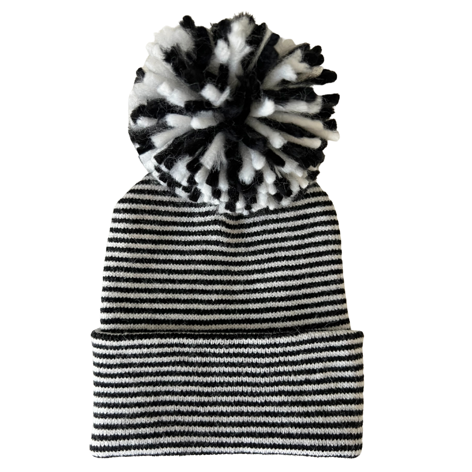 Striped black and white knit beanie hat with a fluffy pom-pom on top.