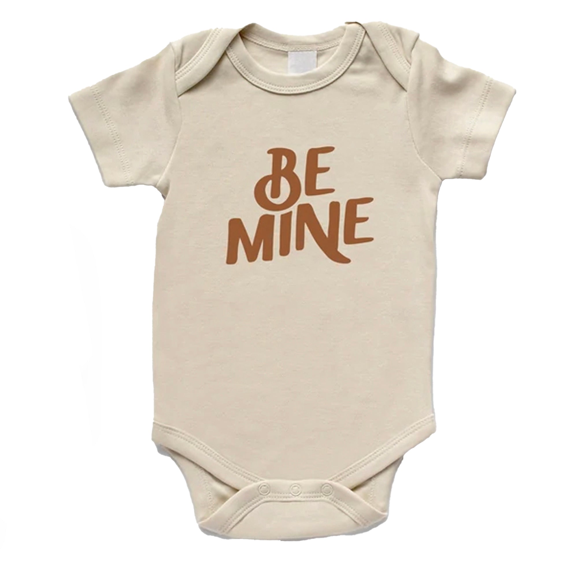 Beige baby onesie with the text "Be Mine" in brown lettering. Perfect for cute, loving outfits.