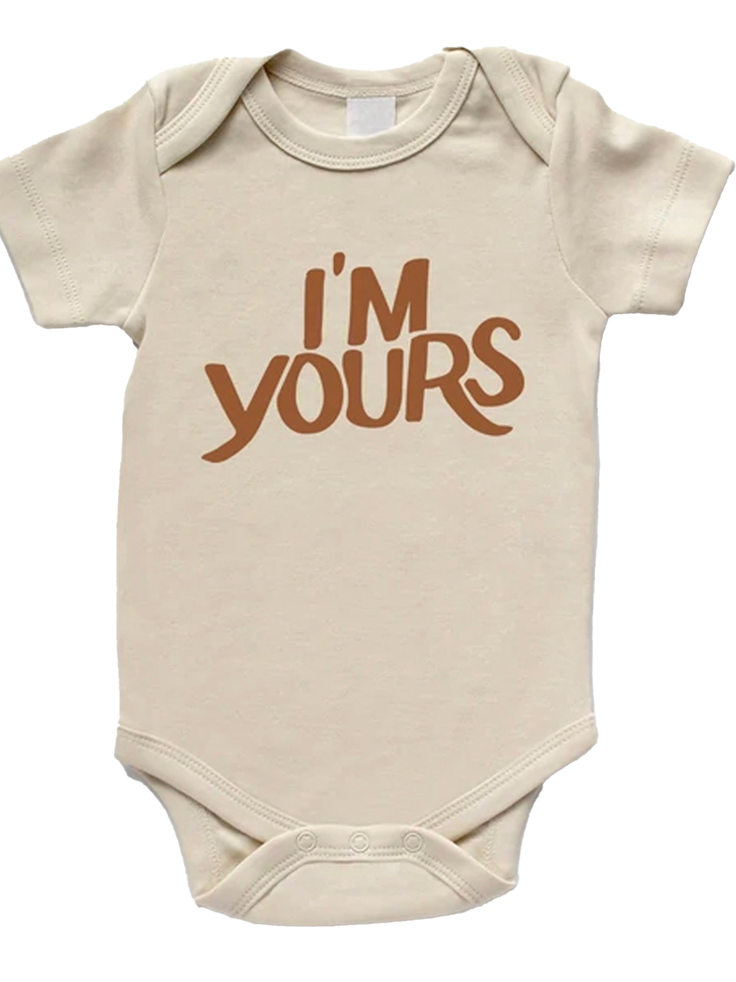 Beige baby onesie featuring "I'M YOURS" in bold brown text. Suitable for infants and toddlers.