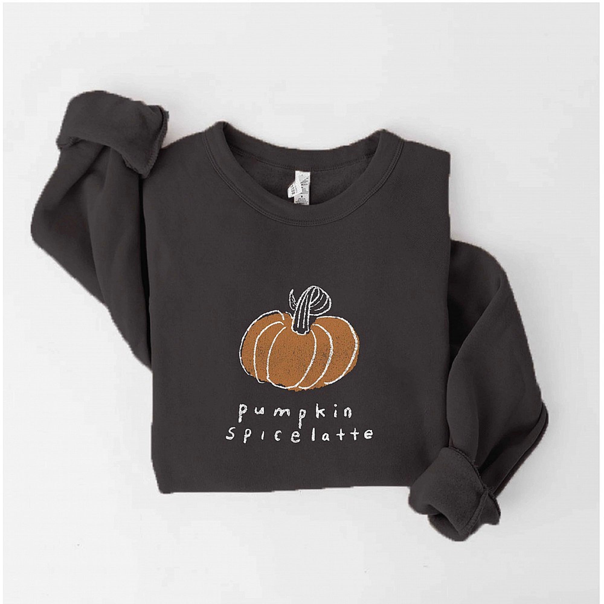 Dark sweatshirt with "pumpkin spice latte" text and orange pumpkin graphic. Cozy fall fashion piece.