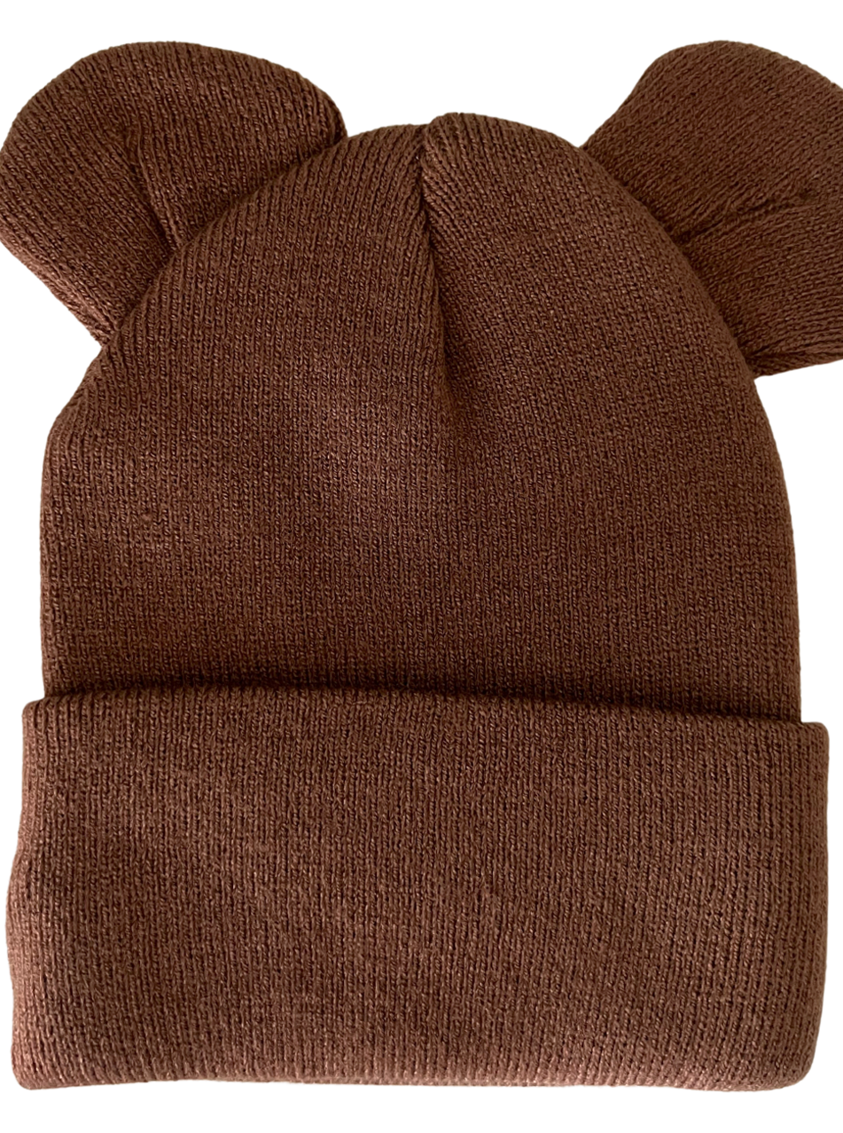Brown knitted beanie hat with bear ears on top, featuring a folded cuff for a snug fit.