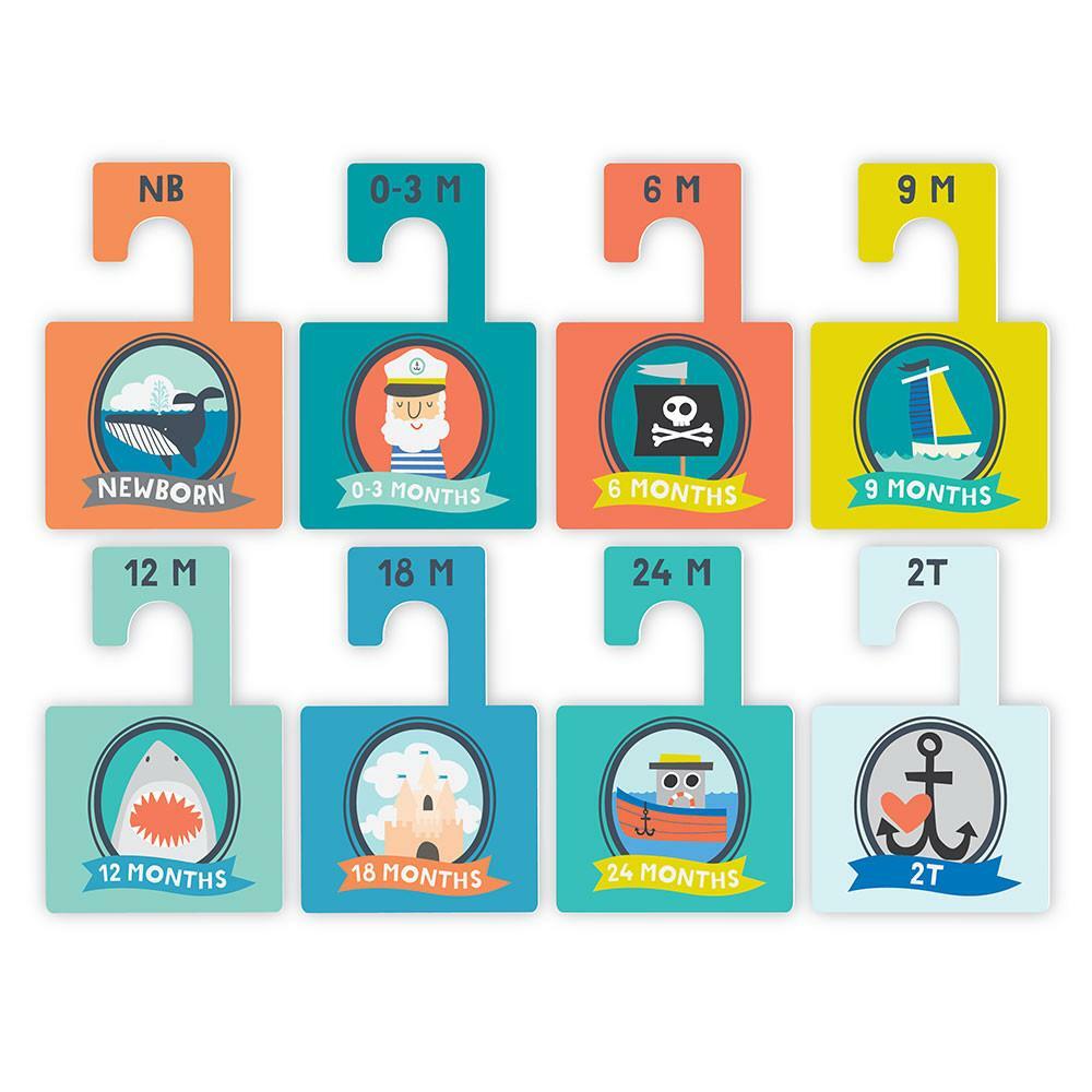 Colorful milestone cards for newborn to 2T, depicting playful themes and age labels.