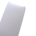 Close-up of a smooth, white surface reflecting light, suggesting a soft texture and contemporary design.
